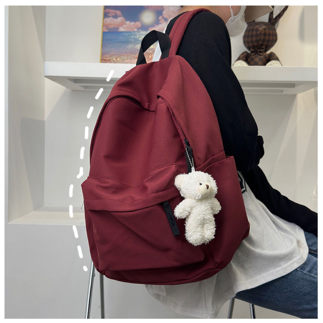 Solid-color large-capacity backpack with dual shoulder straps