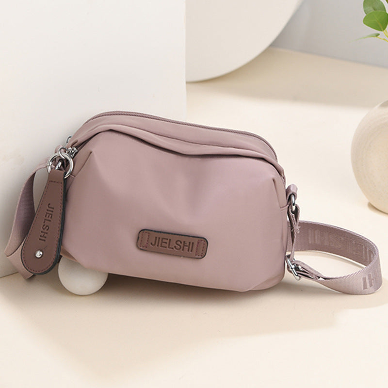 Solid-color Oxford fabric crossbody bag