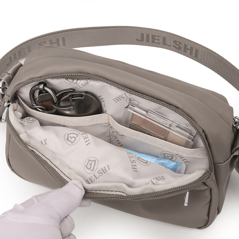 Solid-color Oxford fabric crossbody bag