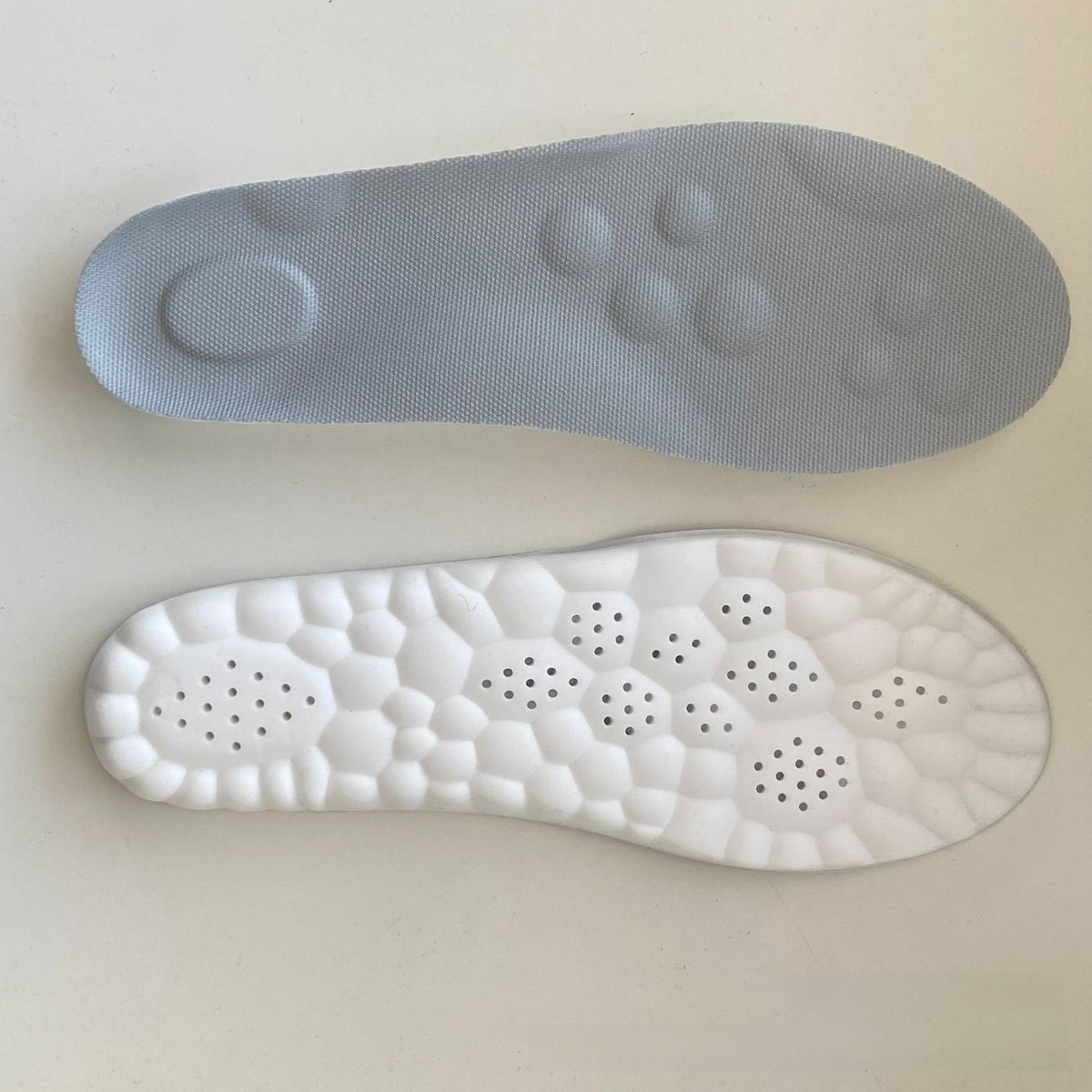 Sports shoe insole