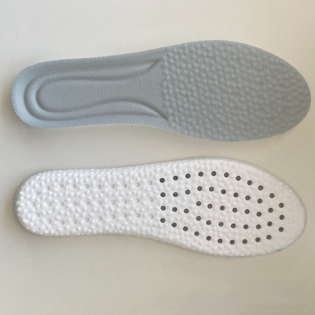 Sports shoe insole