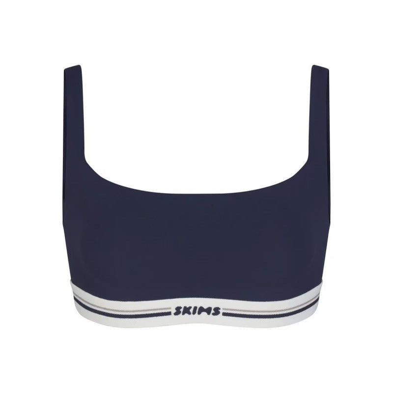 Sports skirt set with bra straps and midriff-baring design