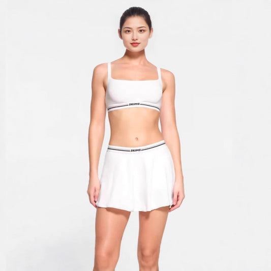 Sports skirt set with bra straps and midriff-baring design