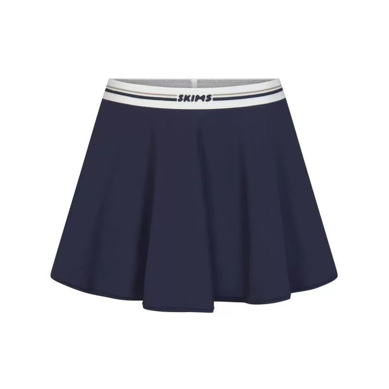 Sports skirt set with bra straps and midriff-baring design