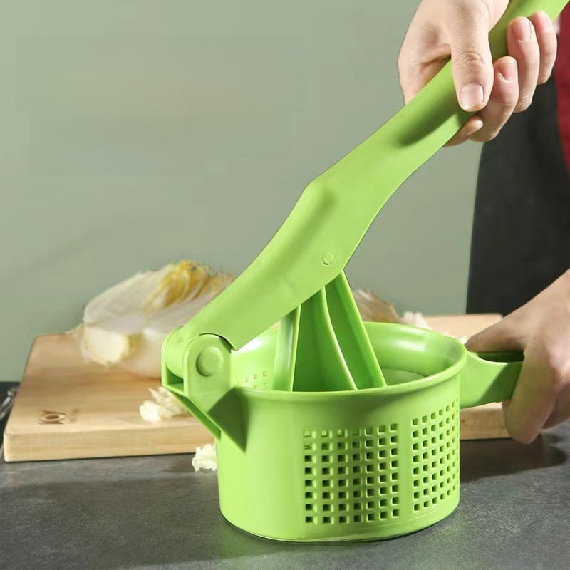 Squeezing vegetable machine