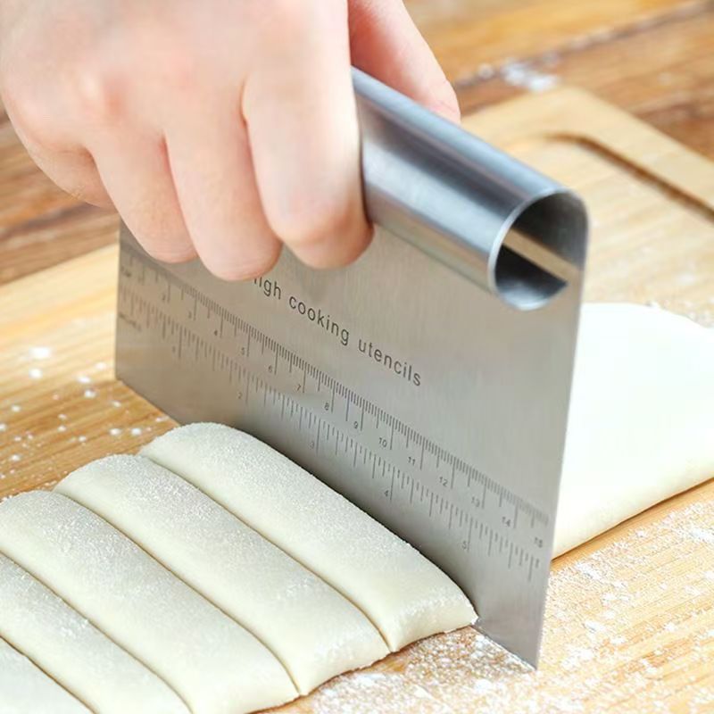 Stainless steel cutting surface scraper