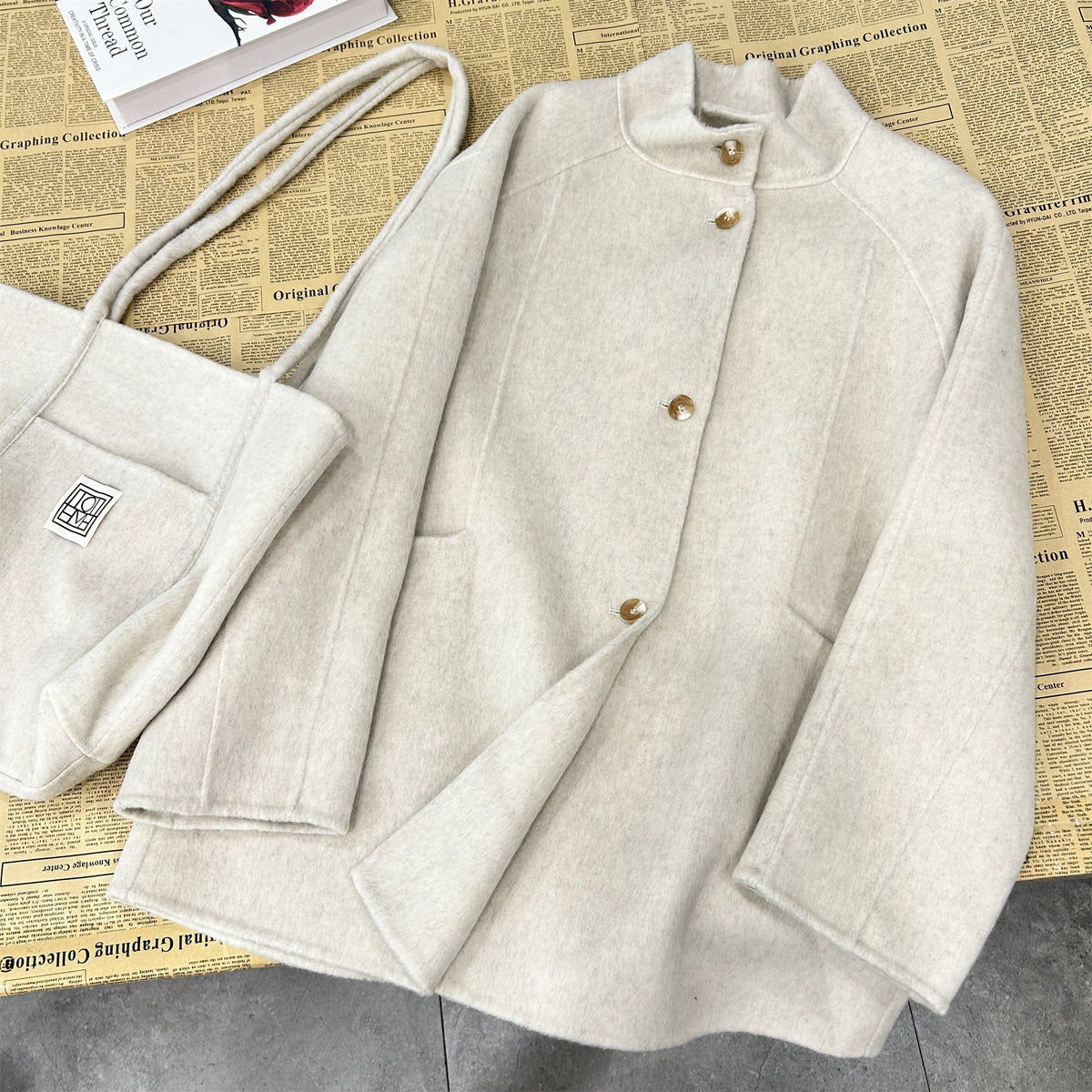 Stand-up collar mid-length wool coat