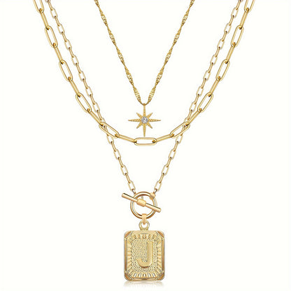 Star, moon, and letter necklace