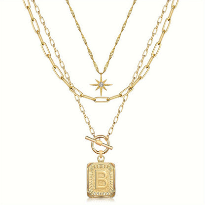 Star, moon, and letter necklace