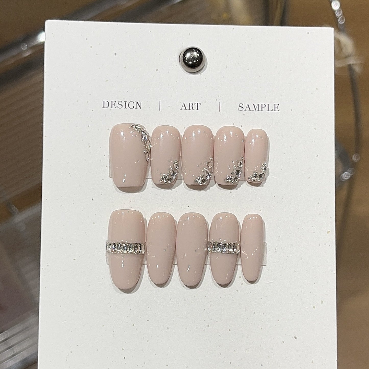 Steel bead and broken diamond wearable nails