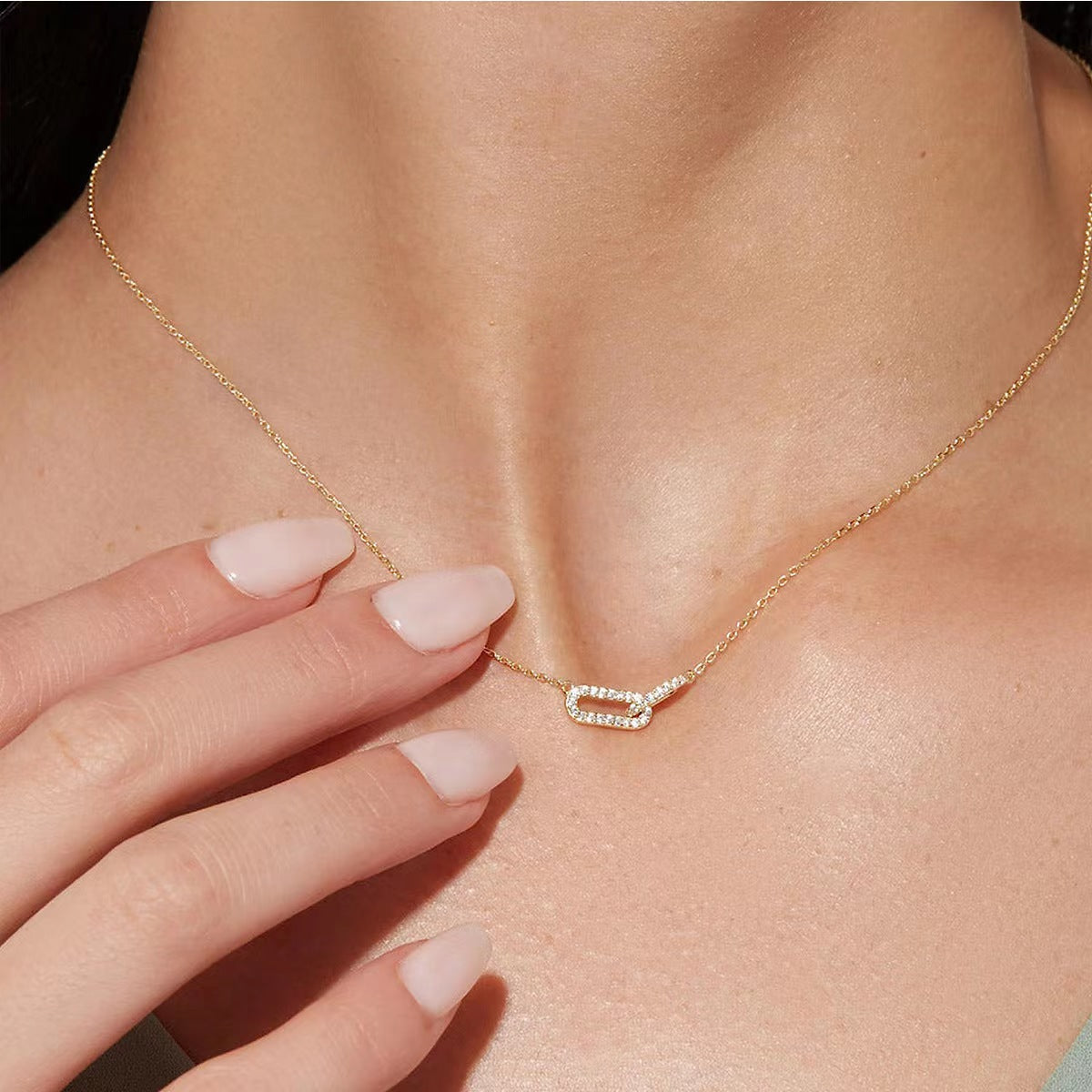 Sterling Silver Double Oval Interlocking Necklace with Diamond Accents