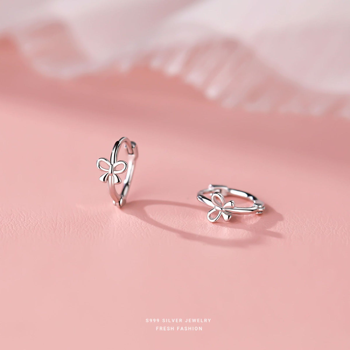 Sterling Silver Hollow Bow Ear Clips for Women