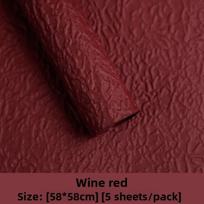 Stone-textured paper