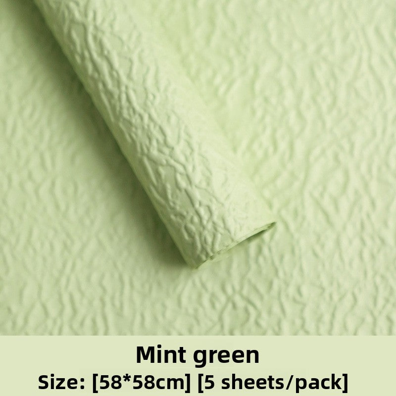Stone-textured paper