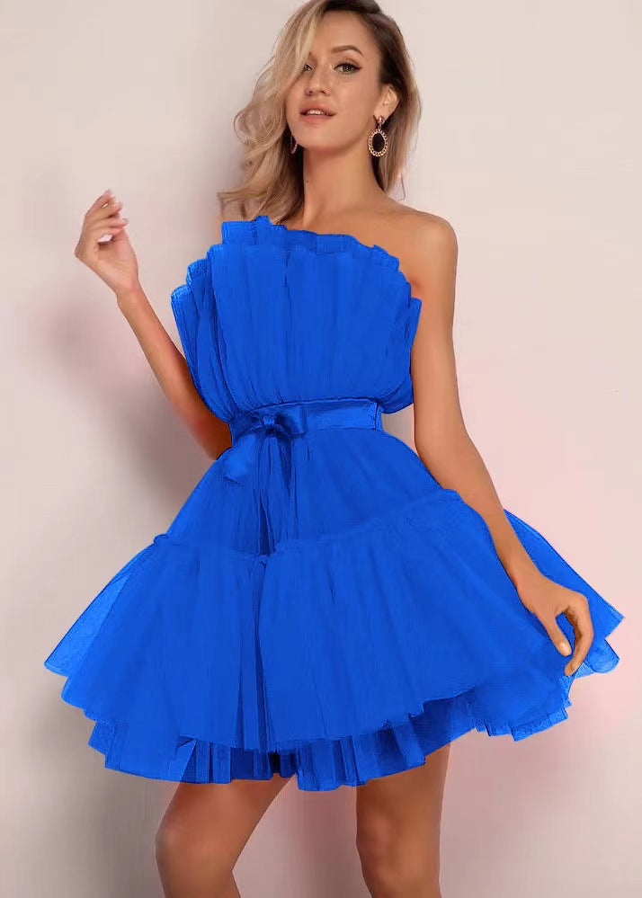 Strapless netted ballgown with bow details and puff sleeves