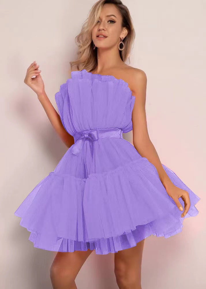 Strapless netted ballgown with bow details and puff sleeves
