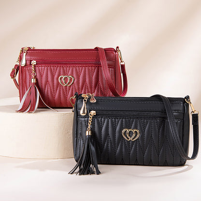 Tassel soft leather messenger bag