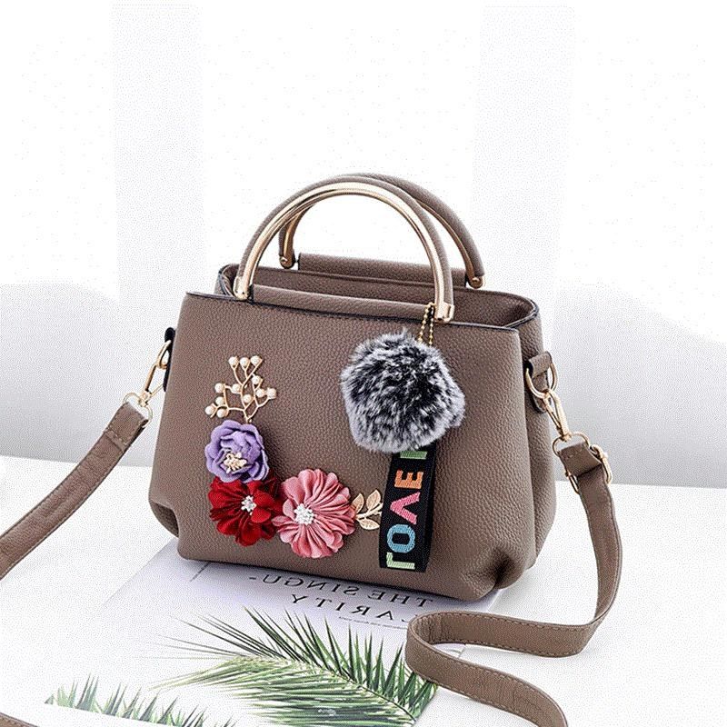 Tattooed floral handbag
