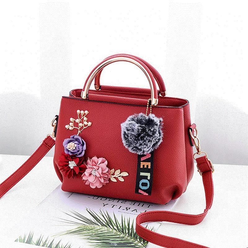 Tattooed floral handbag
