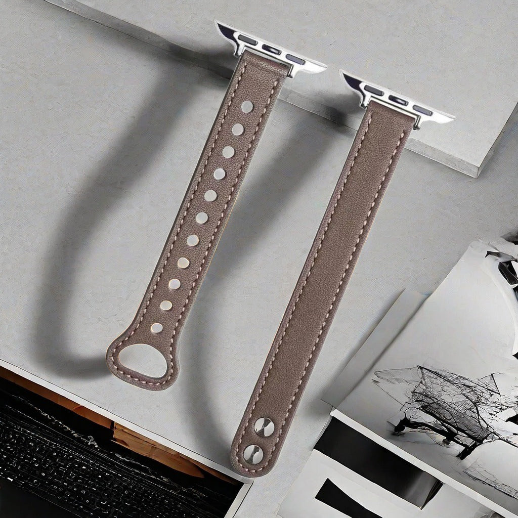 The Apple Watch features a slim double-pin strap