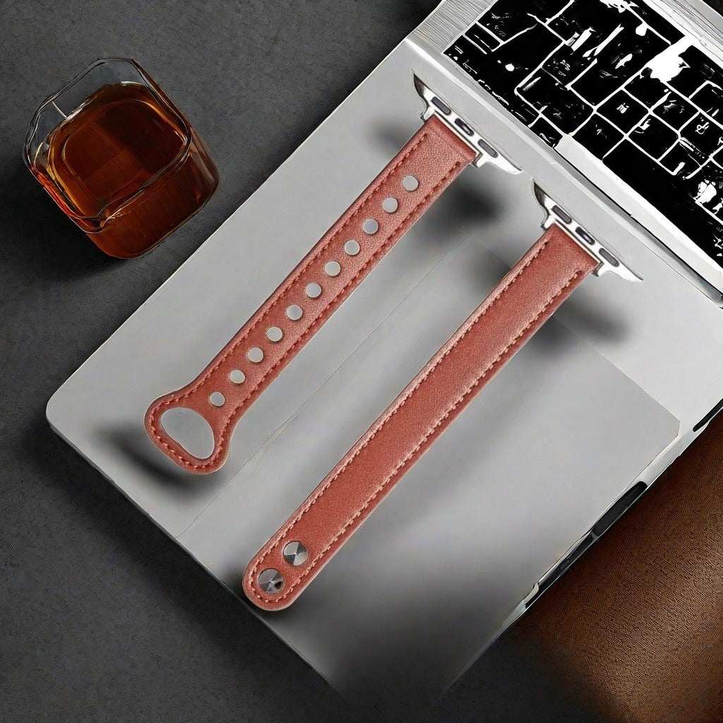 The Apple Watch features a slim double-pin strap