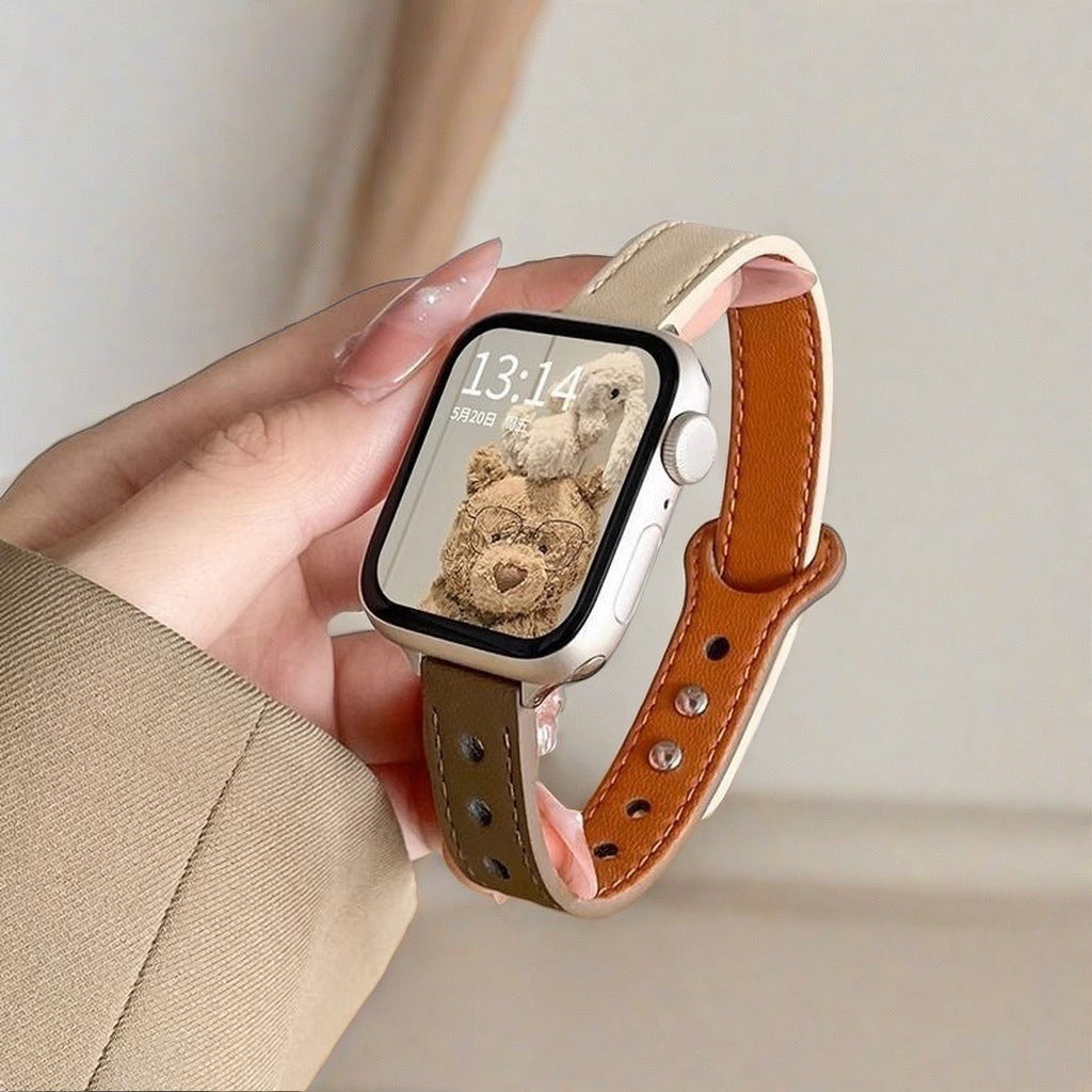 The Apple Watch features a slim double-pin strap