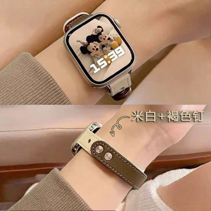 The Apple Watch features a slim double-pin strap