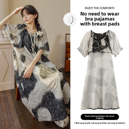 The cat man wore a sleeping skirt with a chest cushion