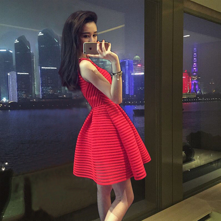 The dress is a red evening gown