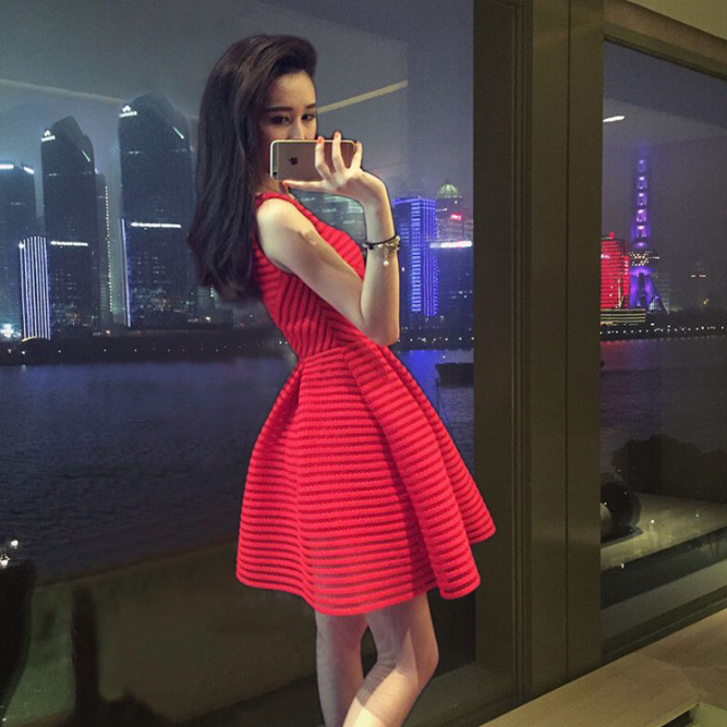 The dress is a red evening gown