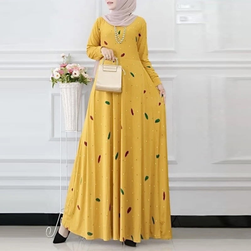 The dress is printed with leaf dots