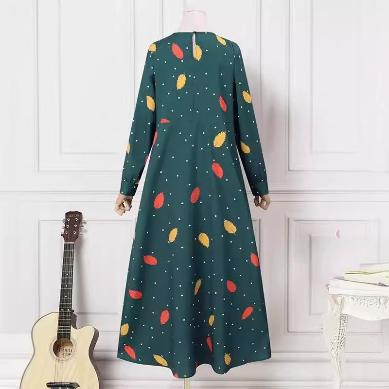 The dress is printed with leaf dots