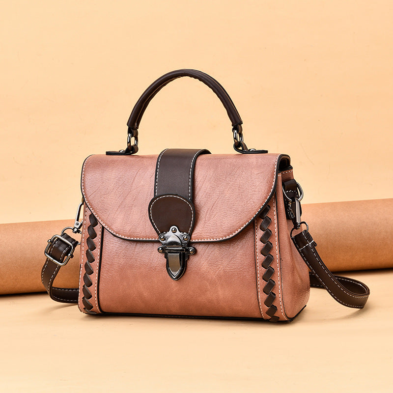 The lady is carrying a crossbody bag.