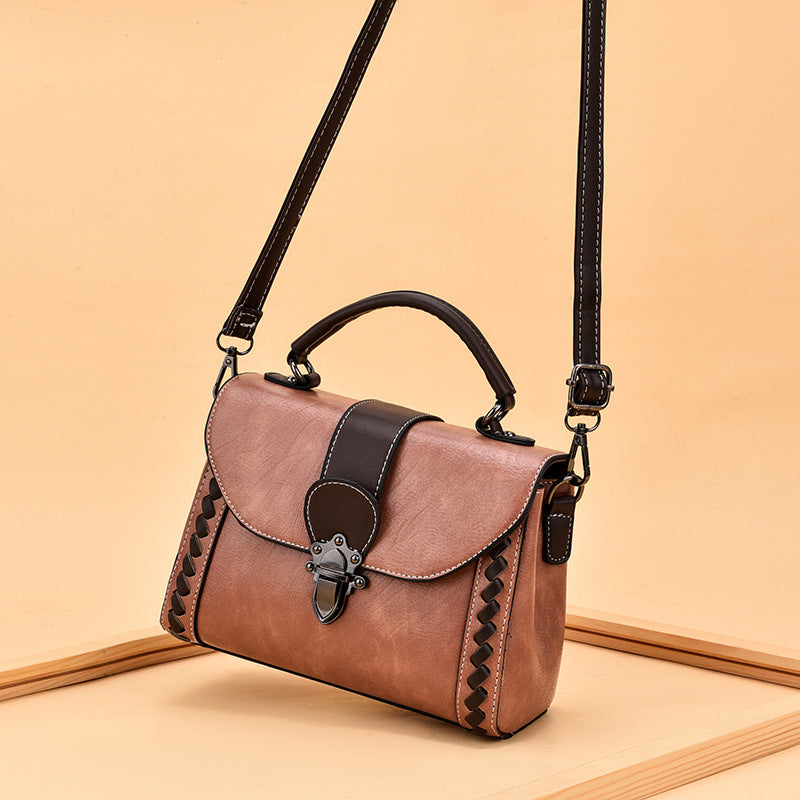 The lady is carrying a crossbody bag.