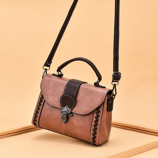The lady is carrying a crossbody bag.