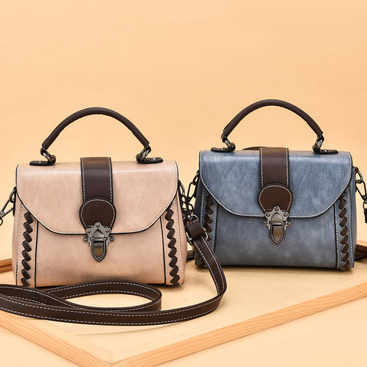 The lady is carrying a crossbody bag.
