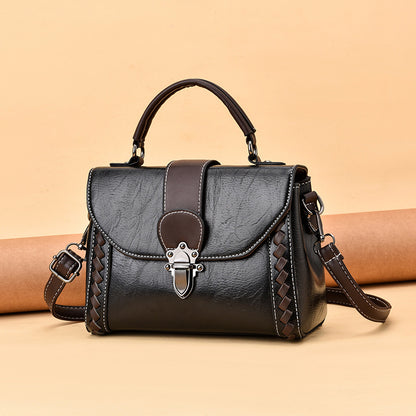 The lady is carrying a crossbody bag.