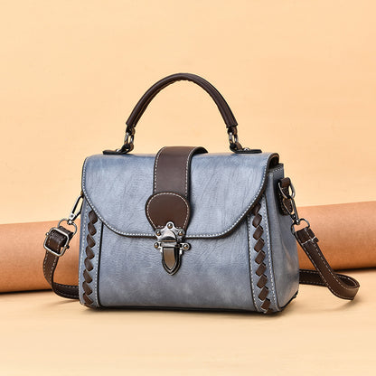 The lady is carrying a crossbody bag.