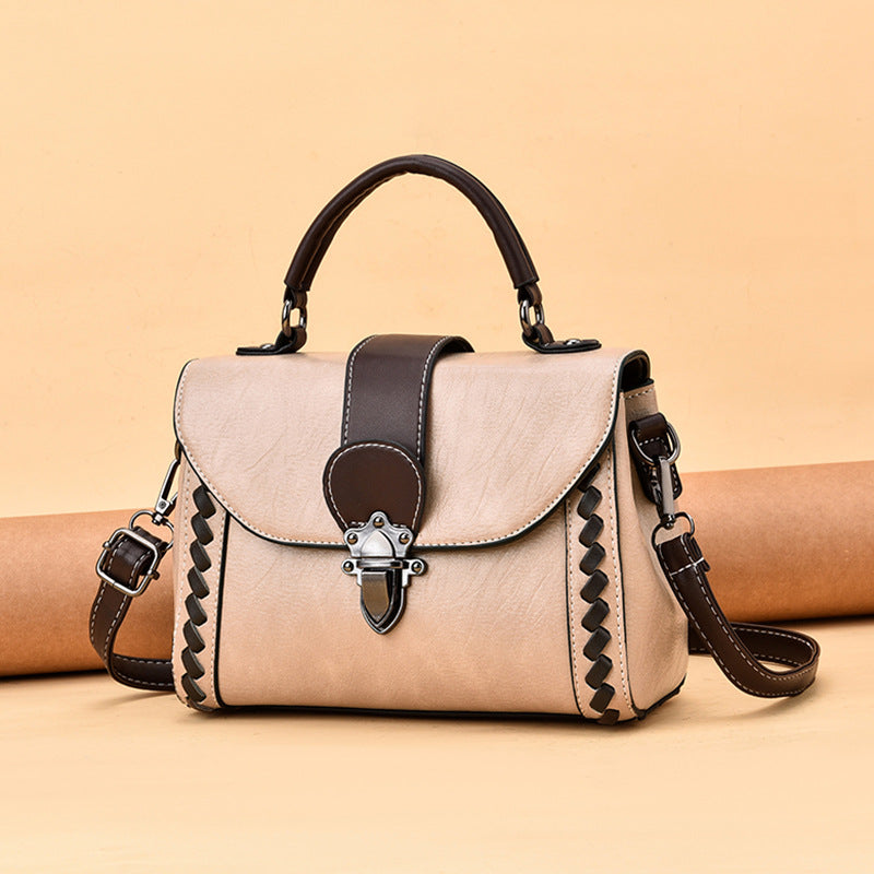 The lady is carrying a crossbody bag.