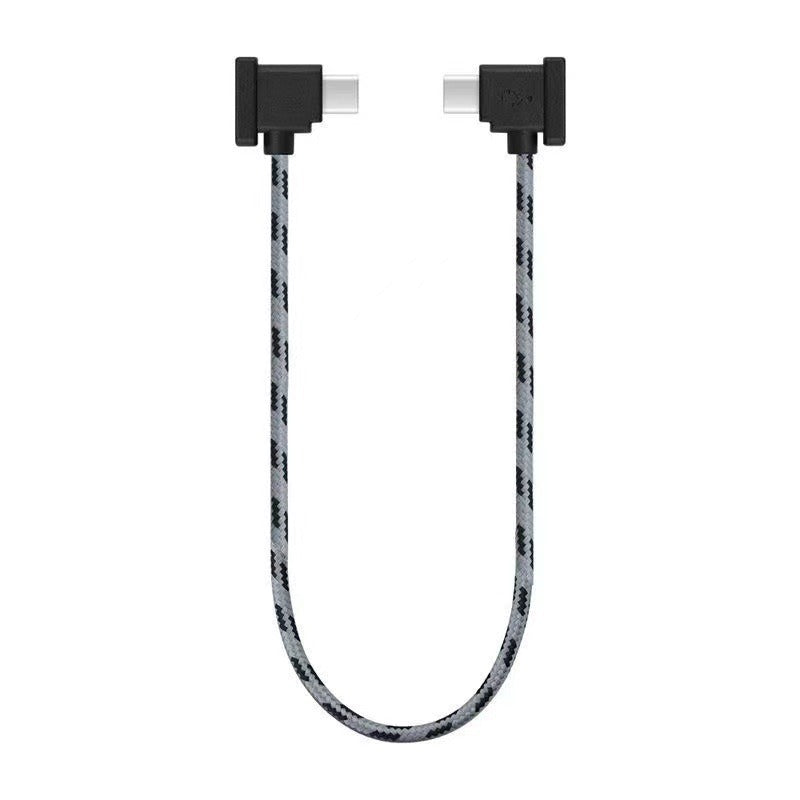The mobile phone is connected to the data cable