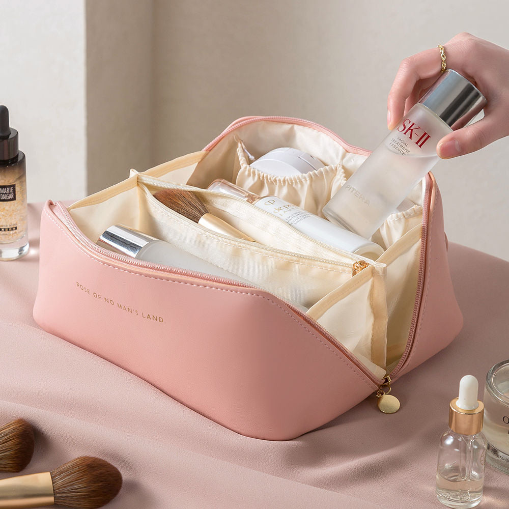 The multi-layered cosmetic bag is used to store travel toiletries