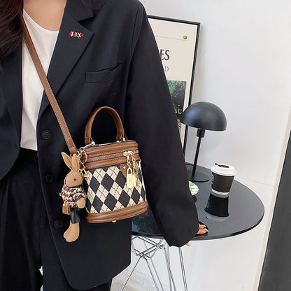 The small bag is a niche crossbody bag for women