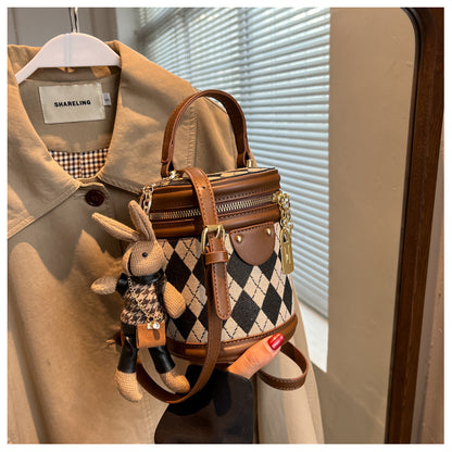 The small bag is a niche crossbody bag for women