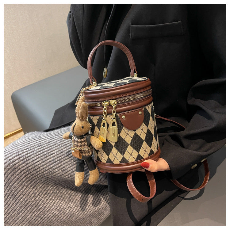 The small bag is a niche crossbody bag for women