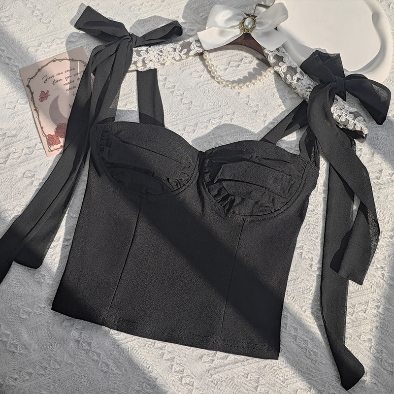 The strappy shoulder straps are purely for outerwear and innerwear. It's a hot and spicy halter top for women