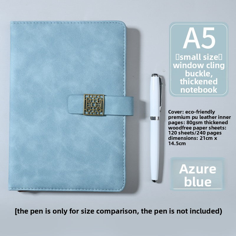 Thick leather-bound notepad