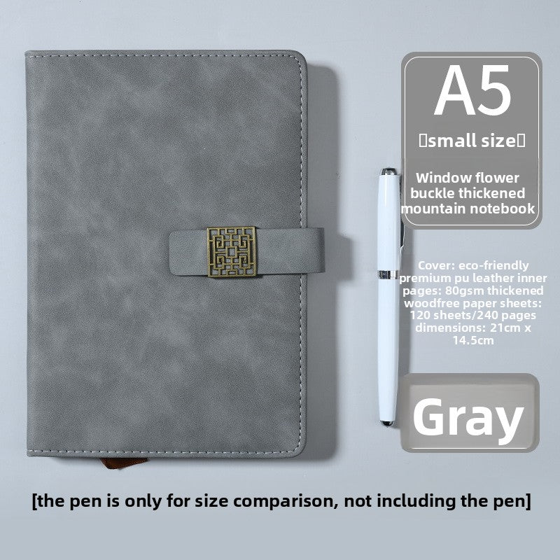 Thick leather-bound notepad