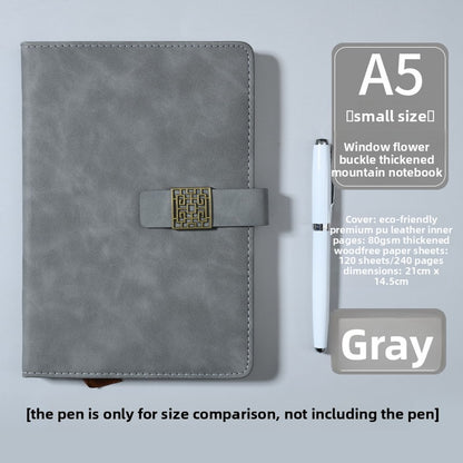 Thick leather-bound notepad