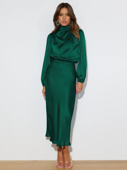 This high-end satin long-sleeved loose dress is an elegant and refined evening dress for women