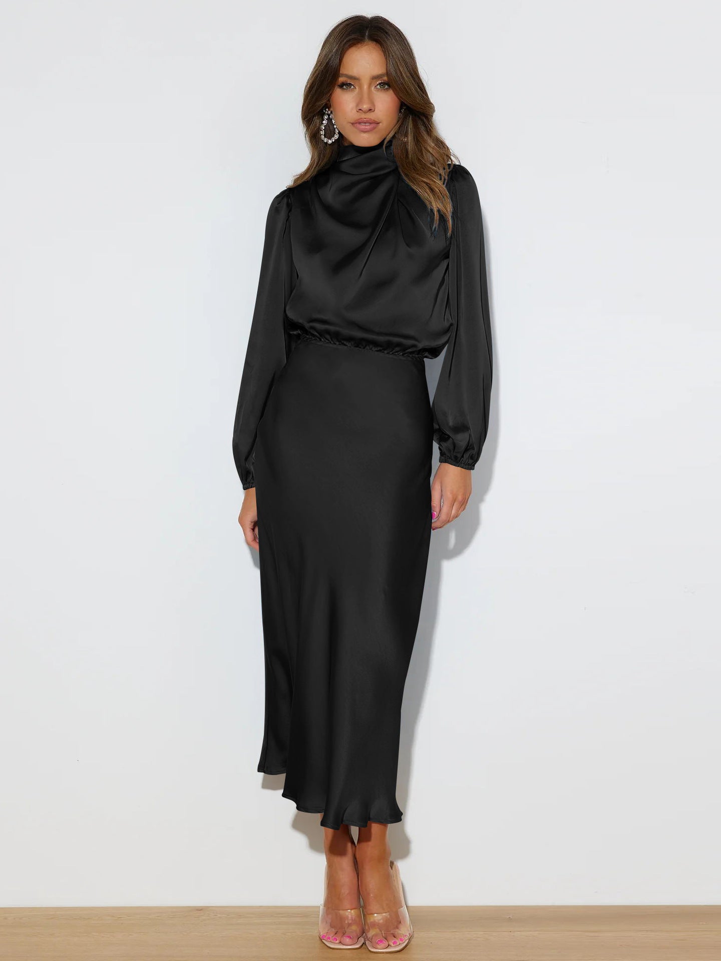 This high-end satin long-sleeved loose dress is an elegant and refined evening dress for women